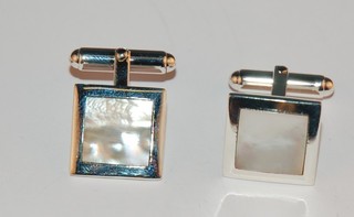 A pair of modern square silver cufflinks set mother of pearl