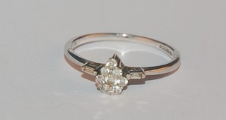 A 9ct white gold cluster dress ring set diamonds