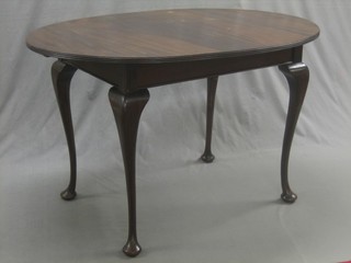 A Georgian style oval extending dining table, raised on cabriole supports with 2 extra leaves 48"