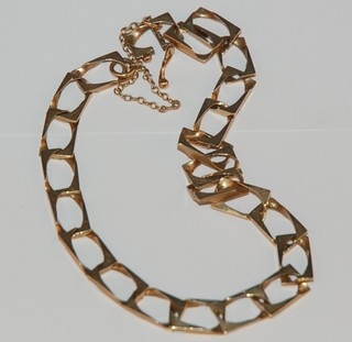A modern 9ct gold flat link bracelet