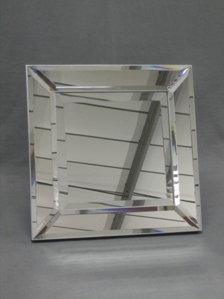 A square bevelled glass wall mirror 15 1/2" x 15 1/2"