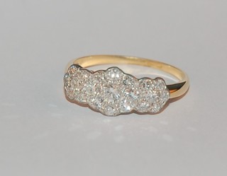 A lady's 18ct yellow gold triple cluster dress ring, approx 0.90ct