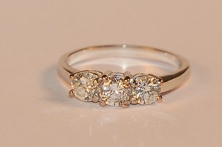 A lady's 18ct white gold dress ring set 3 diamonds, approx 1.20ct