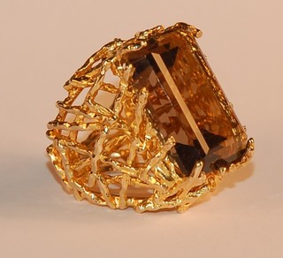 A 9ct gold dress ring set a rectangular cut smokey quartz