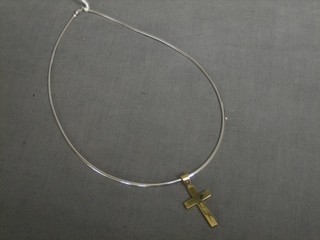 A 9ct yellow gold Greek cross hung on a 9ct white gold chain