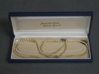 A rope of Pompadour pearls