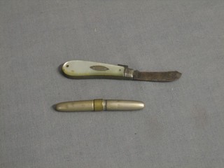 A silver bladed folding pen knife and 1 other item