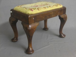 A walnut Queen Anne style footstool