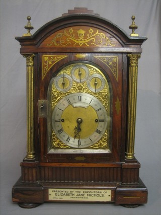 A handsome Edwardian 8 day grand sonnier striking fusee bracket clock, the 8" arch shaped gilt dial with Roman numerals, having a chime/silent indicator, slow/fast indicator and Cambridge Chime/Westminster Chime and with a silvered chapter ring, having a 7 1/2" back plate and striking on 8 bells, contained in an arched mahogany case with gilt columns to the sides 
