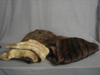 A mink cape, 1 other stole and a mink coat
