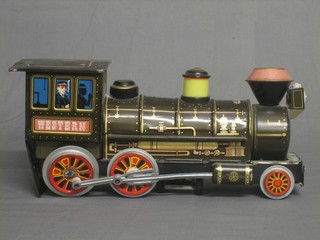 A modern tin plate toy in the form of a locomotive, marked Patent No. 557116 11"