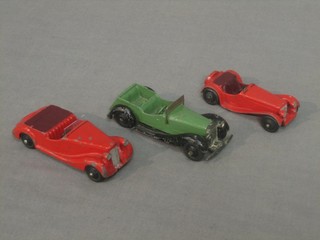 A Dinky red Sunbeam Talbot, a Dinky red Jaguar SS100 and a green Dinky Sports Car