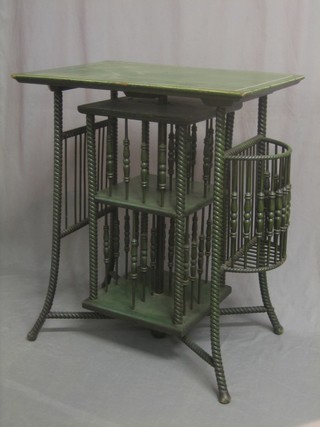 An Edwardian Adam green rectangular painted table, the base incorporating a revolving bookcase with bobbin turned decoration 27"