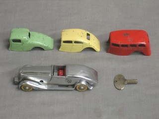 A  Solido clock work car with detachable body and having 3 other bodies