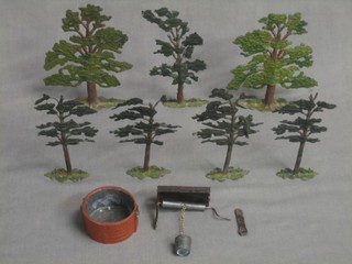 A Britains model well (f), various Britains models of trees