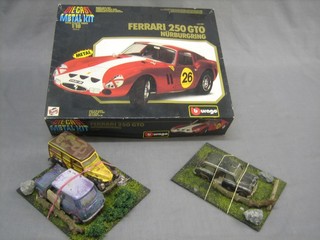 A Burago metal die cast kit for a Ferrari and 3 other model cars