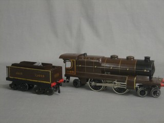 A French Hornby clockwork locomotive and tender