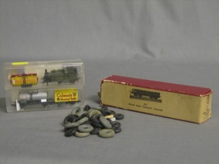 A Taix Twin N gauge passenger wagon no.376, a model N gauge locomotive, 3 items of rolling stock and a collection of various plastic tyres