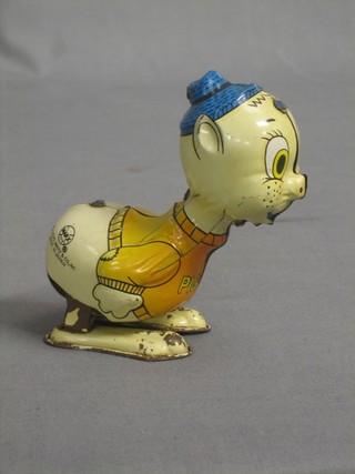 A Louis Marx & Co tin plate clockwork figure of Piggy 4"