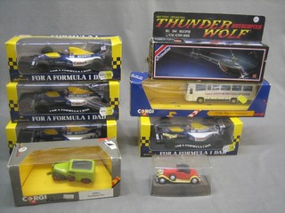 A collection of various die cast model racing cars etc