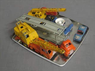 A  Dinky Super Toy 20 ton lorry mounted crane no. 972, a Dinky Super Toy Coles mobile crane, a Morston Series car transporter, a Dinky model tractor, a Dinky Triumph TR2 and a Corgi Major HDL hovercraft