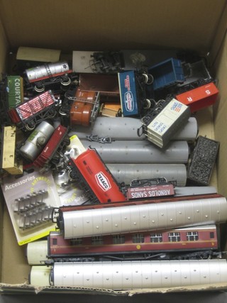 A quantity of various rolling stock, unboxed