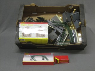 A quantity of various plastic railway buildings