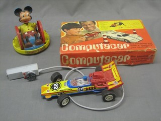 A Comptacamp model car, a toy racing car, a Barbie Doll etc