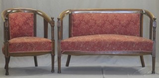 An Edwardian inlaid mahogany 7 piece drawing room suite comprising 2 seat tub back settee, pair of tub back chairs and 4 standard chairs