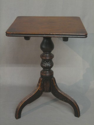 A 19th Century square mahogany snap top wine table, raised on pillar and tripod supports 15"