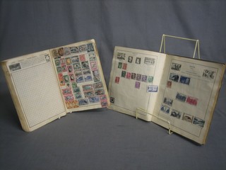 The Wanderer stamp album together with a blue Standard  stamp album