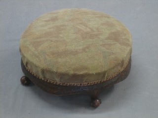 A Victorian circular carved walnut footstool 14"