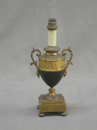 An Empire gilt metal style table lamp in the form of a twin handled urn 12"