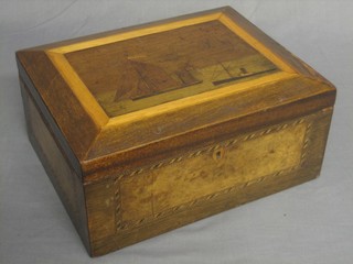 A 19th Century rectangular mahogany writing box with hinged lid inlaid a scene of a Thames barge and boat, having a fitted interior 11"