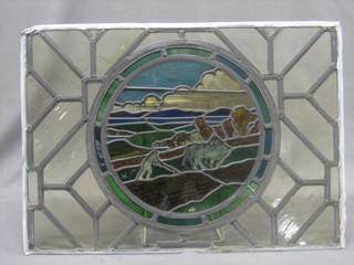 A 1930's lead glazed stained glass panel depicting a ploughing scene 18" x 26"