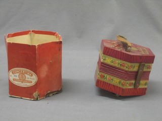 A 6 sided concertina with 11 buttons by Scholer (f)