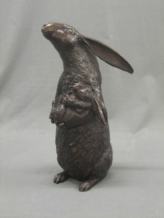 A bronze figure of a standing hare with leveret 18"
