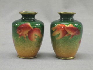 A pair of Japanese green ground cloisonne enamelled vases of globular form, decorated diving fish 4", bases marked Made in Japan