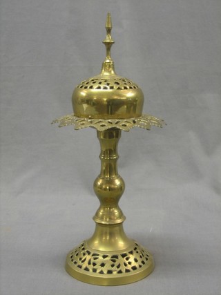A circular pierced Eastern brass incense burner