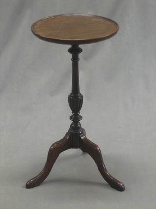 A circular Georgian style mahogany wine table 11"