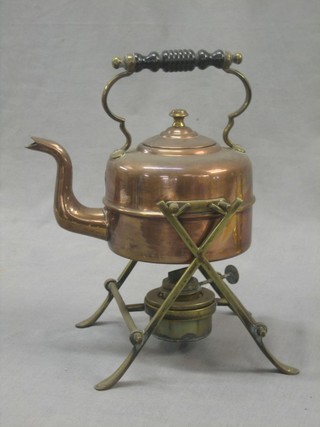 A 19th Century copper spirit kettle with brass stand and spirit burner