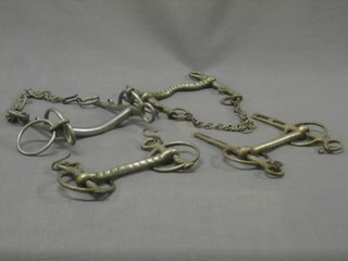 4 various snaffle bits