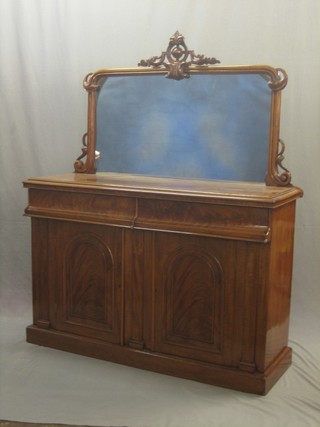 A Victorian walnut sideboard with raised mirrored back, the base fitted 2 long drawers above a pair of cupboards enclosed by a pair of arch shaped panelled doors, raised on a platform base 53"