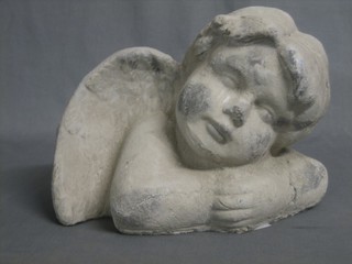 A plaster head and shoulders portrait bust of a cherub 12"