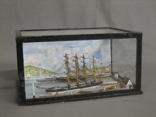 A model harbour scene with a British full masted Merchant ship and 1 other contained in a display case 11"