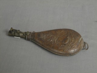 A 19th Century embossed leather shot flask decorated pheasants