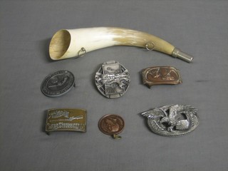 A Smith & Weston buckle, 4 other belt buckles, a bronze medallion and a horn