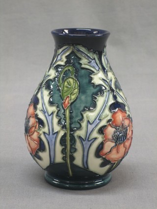 A  Moorcroft pottery club shaped vase with poppy decoration, the base impressed Moorcroft, Made in England 96, 5"