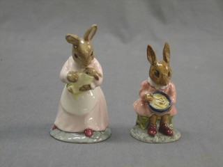 A Royal Doulton Bunnykins figure - Bunty Helping Mother DB2 together with  Mother and Baby (second) DB167