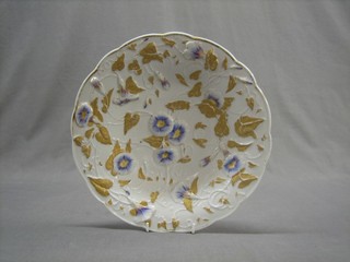 A circular "Meissen" porcelain bowl with leaf decoration, the base with crossed sword mark 7"